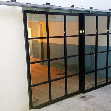 Cerrajería Dugaval puerta de garaje con cristal 